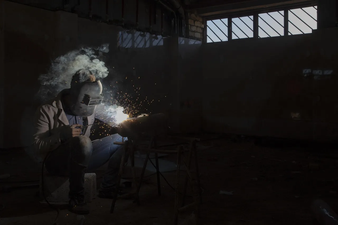 RCM Metal Works welder performing custom welding in Murray, Utah shop